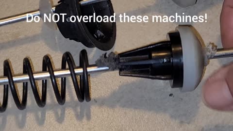 Top load washer suspension worn out from overload. Whirlpool / Maytag variants.