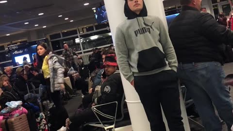 Man Creating a Scene at Seattle Airport Breaks into Song