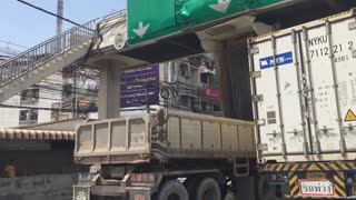 Semi Truck Stuck Under a Bridge