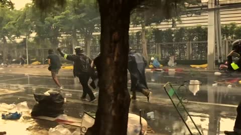 Thailand protests: More than 40 injured as clashes rock Bangkok - BBC News