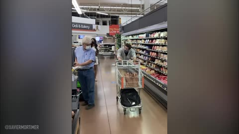 man floats through store