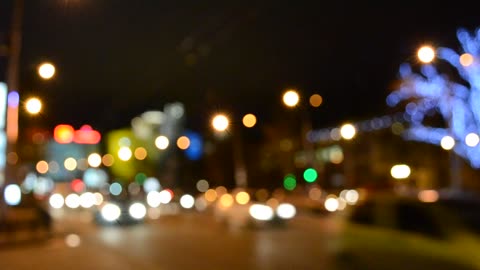 City lights out of focus over a street