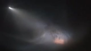 SpaceX Falcon 9 rocket penetrating the firmament