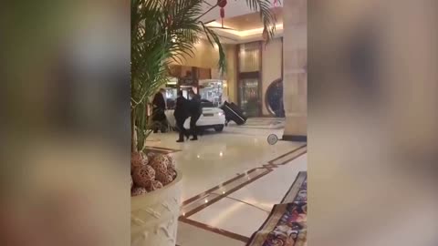 Angry hotel guest smashes car into Shanghai hotel
