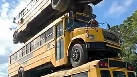 How Many School Buses Can We Stack? MrBeast