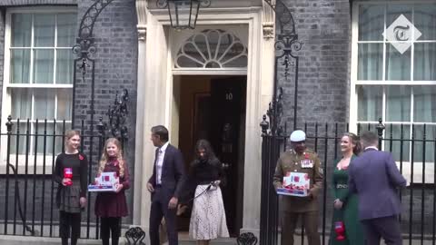 Prime Minister Rishi Sunak awkwardly buys poppies for wife and dog outside