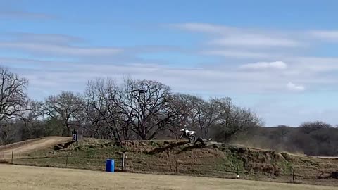 Attempts a Jump in a Motocross Round but Misses His Landing and Falls