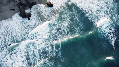 Drone View Of Big Waves Rushing To The Shore