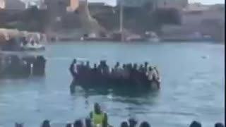 Lampedusa island, Italy. See all the women? Tell me this isn't a planned invasion.