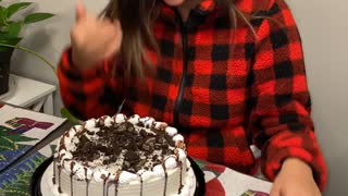 Sibling Pushes Sister's Face into Hard Ice Cream Cake