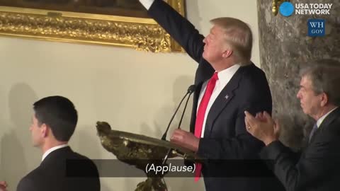 Trump leads crowd in standing ovation for Hillary Clinton