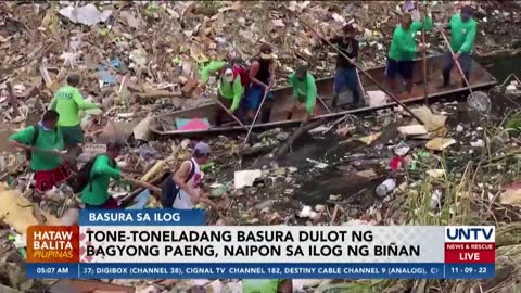 Tone-toneladang basura dulot ng Bagyong Paeng, naipon sa ilog ng Biñan