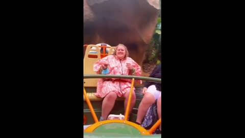 Dude is not happy about getting wet on water ride