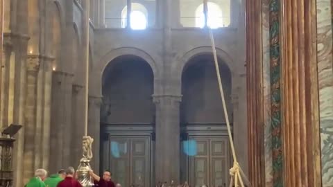 The Botafumeiro (Incense Burner) Swings at the Pilgrim's Mass in St. James Cathedral.