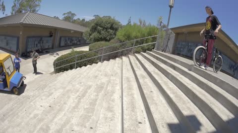 BMX Rider Ignores Security Guard and Lands Trick Over Stairs