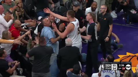 Nikola Jokic shoving the Suns owner Mat Ishbia