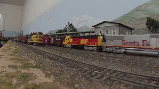 Santa Fe FP45 100, SD75M 226 and SD45-2 5809 stopping in Colton for a crew change