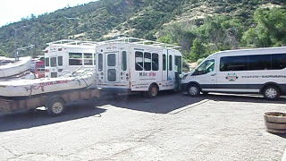 (422) 2003 Ford E-450SD 7.3L Powerstroke Diesel Transit bus pulling up with a trailer