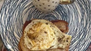 Breakfast tea and bread with egg