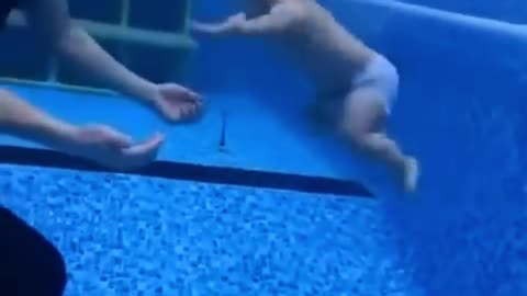 Funny Kid is Swimming