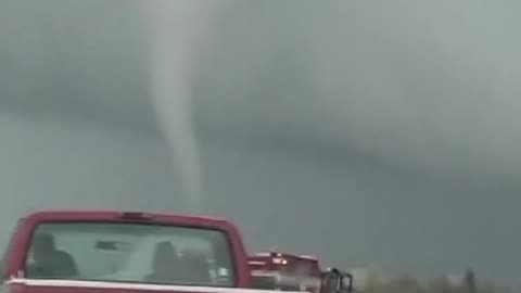 Cars drive by tornadoes tearing across Texas and Nebraska_1080p