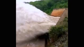 Deadly flooding in Kenya bursts dam, creating raging geyser