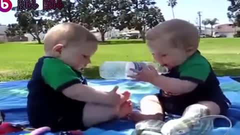 baby funny , crazy videos twin baby fights over bottle