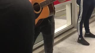 Guitarist guy present in subway