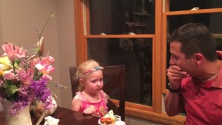Little Girl Disgusted by Dad Eating Fake Food