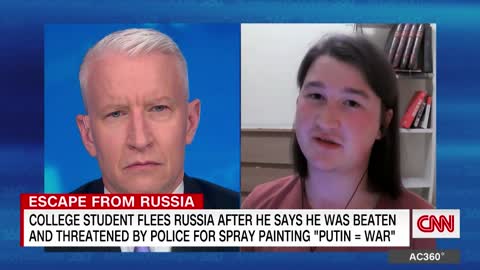 Russian college student spray painted 'Putin = war.'