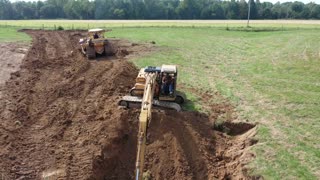 Ralph & Kevin Wood Building A Pond