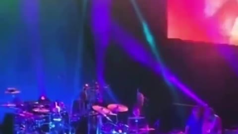 Carlos Santana collapses on Pine Knob stage in middle of song, taken off on stretcher.