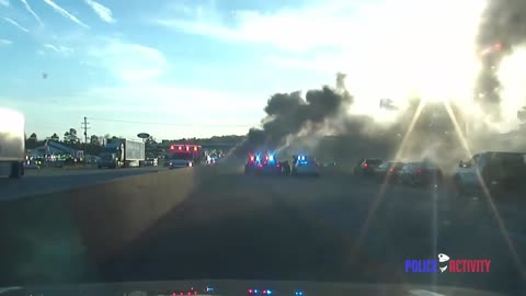 Raw Dashcam Video Shows Cops Rescue Man From Burning Hummer