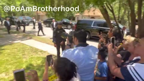 crowd chants to President Biden as he exits Sacred Heart after mass of school shooting,