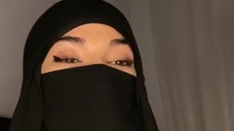 A Muslim woman sings with a beautiful voice