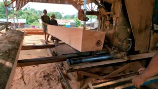 The Process Of Processing Boards From Meranti Wood Red Stone