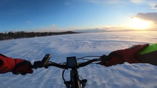 Riding into a Snowy Sunset