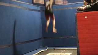 Kid does back flips on trampoline lands on neck