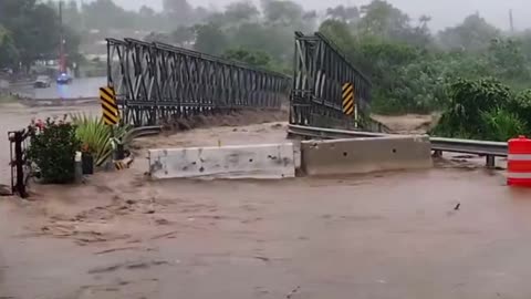 a Bridge was swept away by flooding in Puerto Rico caused by Hurricane Fiona.