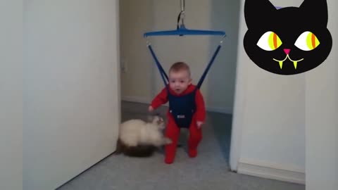 Cute baby playing with cat so friendly