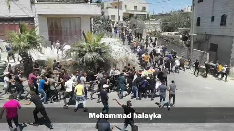 ISRAELI OCCUPATION FORCES ATTACK A PALESTINIAN CHILD`S FUNERAL
