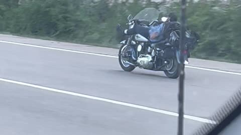 Motorcycle Rider Reclines Comfortably on the Highway