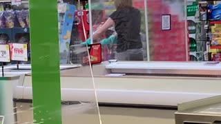 Lady Seen Shopping at Store in Portable Germ Bubble