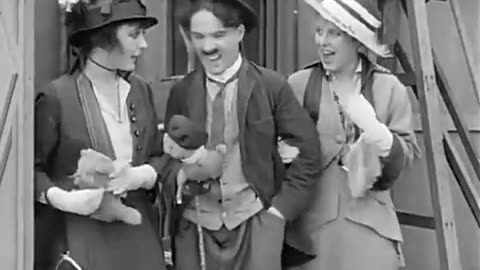 1914 Charlie Chaplin The Masquerader