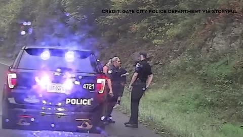 Police officer saves colleague from out of control vehicle