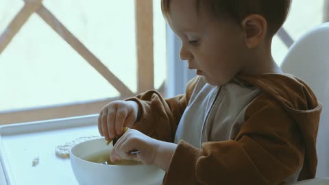 cute baby is eating