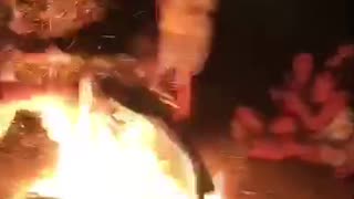 Riding bike over fire at party fail