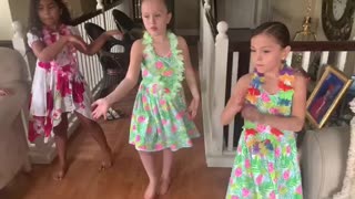 My daughter dances with her cousins.
