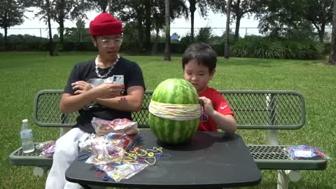 WATERMELON vs 500 RUBBER BANDS!! **funny challenge w/ lil brother**