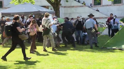 Pro-Palestinian protestor at the Emory University gets tackled by a trooper